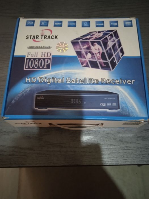 Продам тюнер для параболической антенны.Новый.Фирма "Стар Трек". Цена