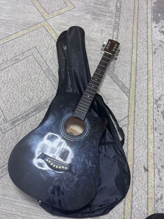 Гитара жағдайы жақсы