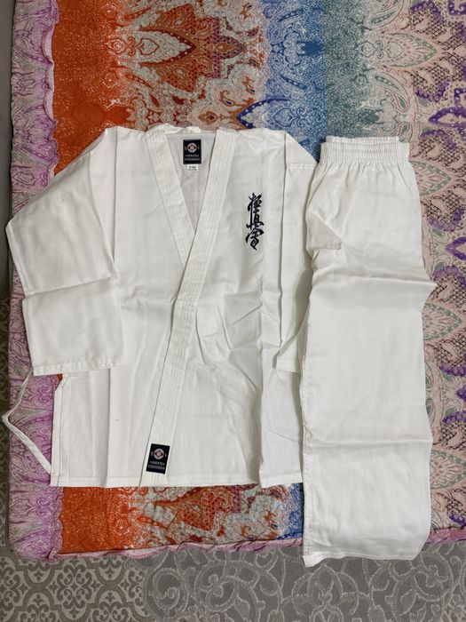 Продам кимано новый