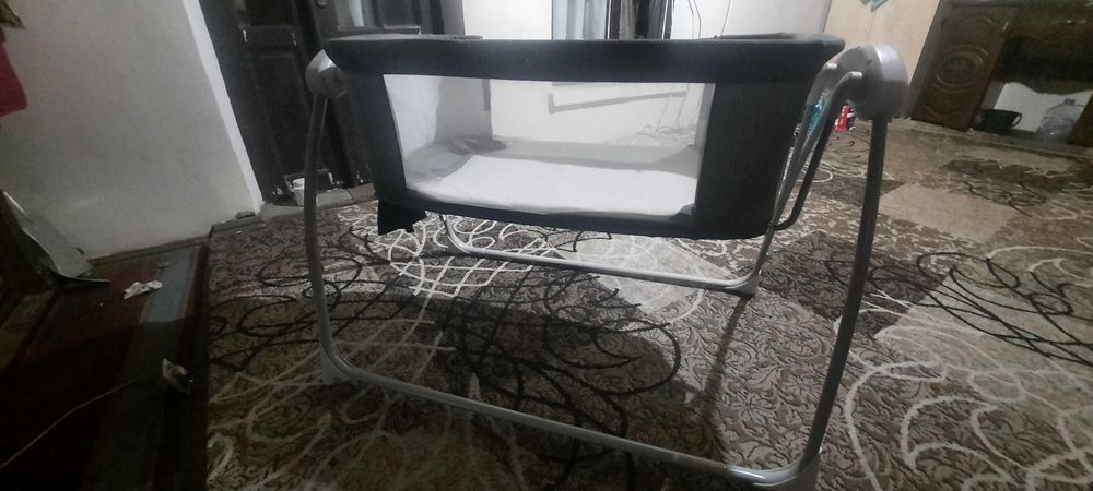 Кроватка с автоукачиванием