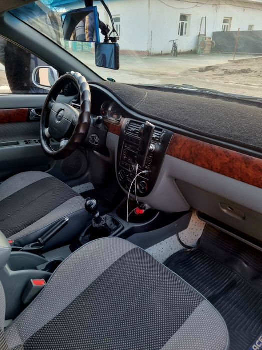 Lacetti 1.8 l yili 2010 yil probrgi 118.000 kraskasi tozza 100%