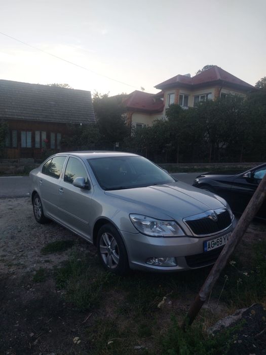 Vand Skoda octavia 2011 o (schimb cu logan pe gaz)