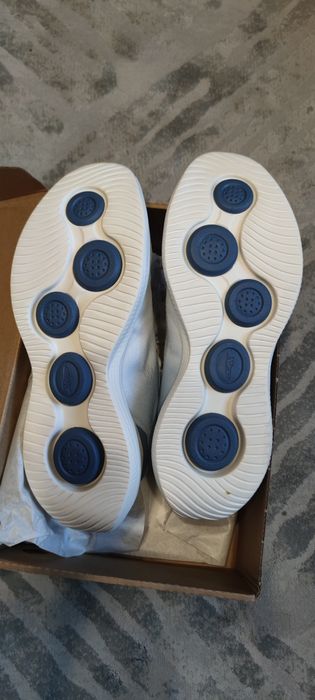 Кроссовки фирмы Xtep