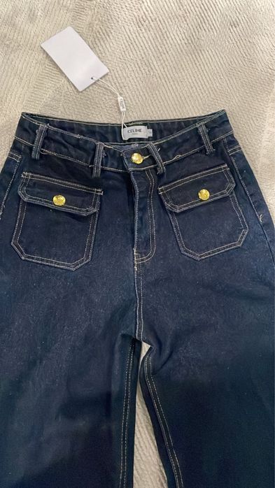 Темно-синие джинсы клеш