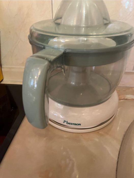 Електрическа цитрус преса