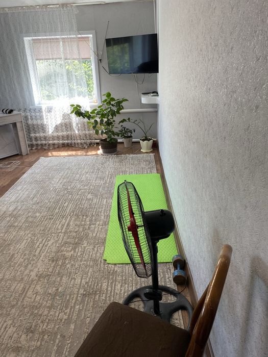 Четырехкомнатный дом в черте города