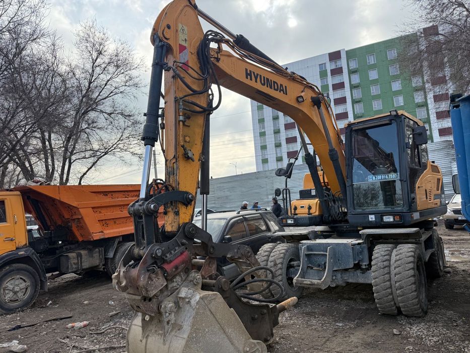 Услуги колесного экскаватора