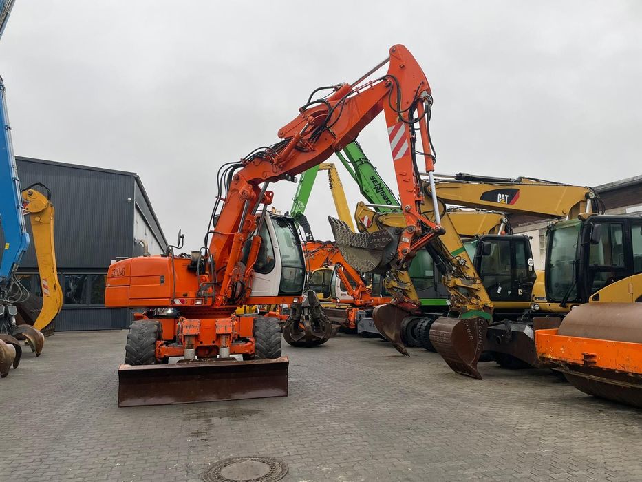 Excavator pe pneuri Liebherr A314 / RATE  LEASING / 2008