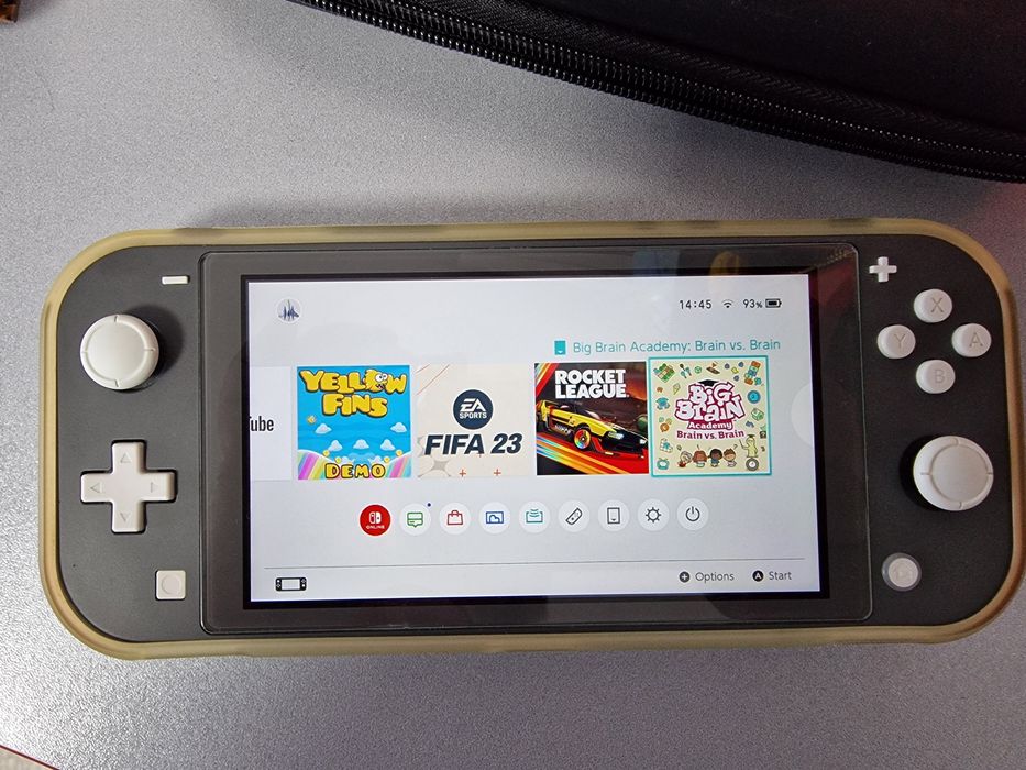 Nintendo Switch Lite + peste 20 de jocuri