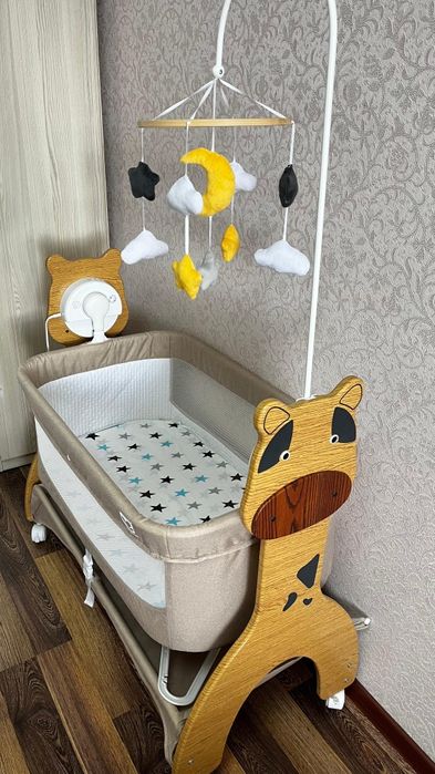 Электронная детская кроватка