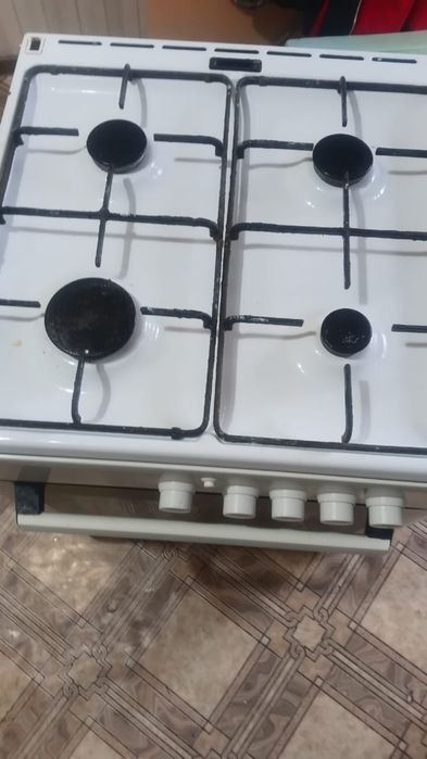 Газовая плита с духовым шкафом б/у.