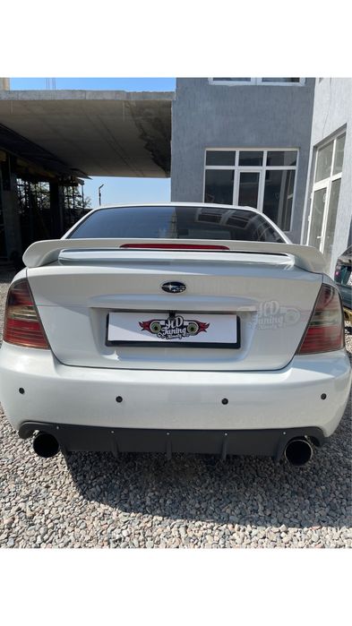 Накладка на крышку багажника Suba Legacy BL рестайлинг/ДОрестайлинг