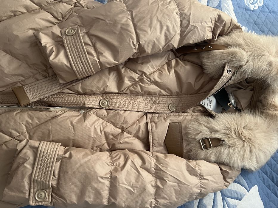 Продам новый пуховик