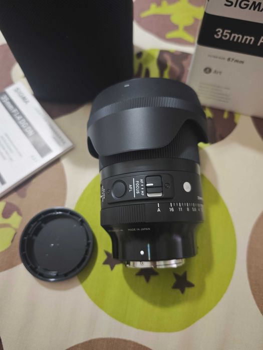 Обектив Sigma 35mm/1,4 DG DN art sony e-mount малко изплзван, кутия, калъф