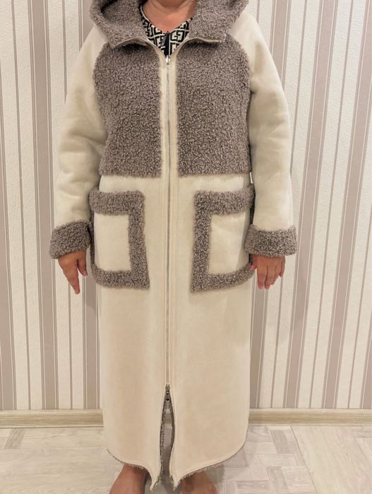 Продам новую зимнюю дубленку