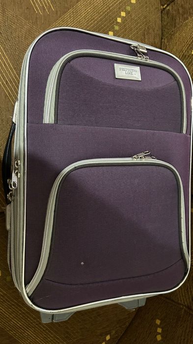 Лилав куфар  за багаж