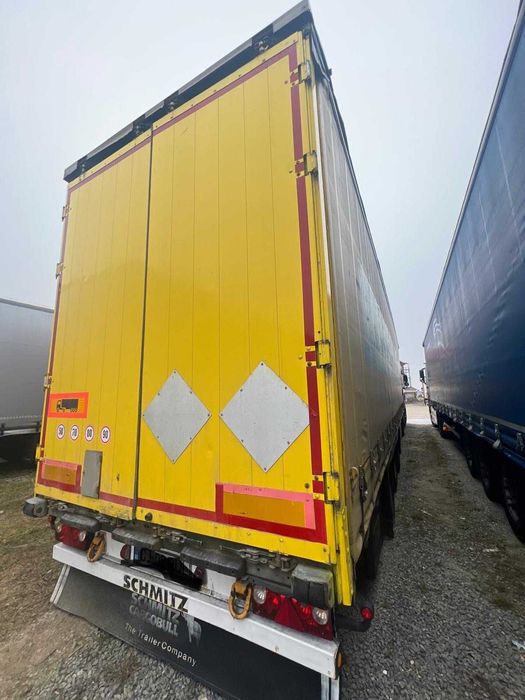 Vând ansamblu - camion DAF și semiremorcă SCHMITZ (mega)