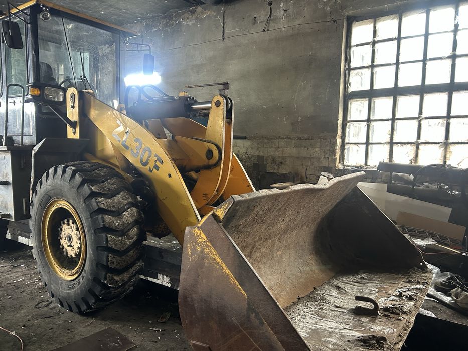 Погрузчик двух кубовый китай 2014