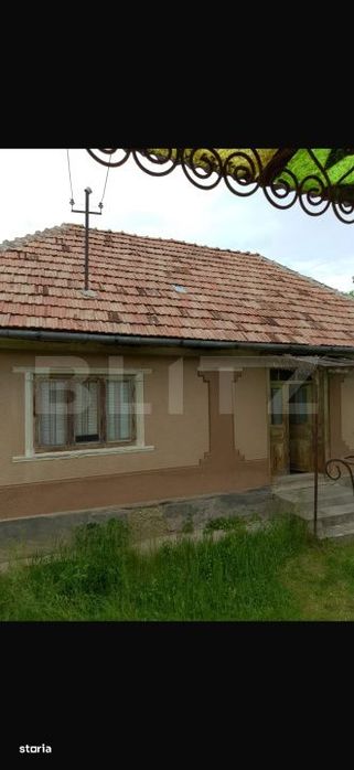 Casa cu 3 camere si un teren de 3000 mp, zona Cuzaplac