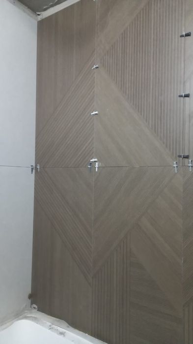 Кафельшик мастер своего дело