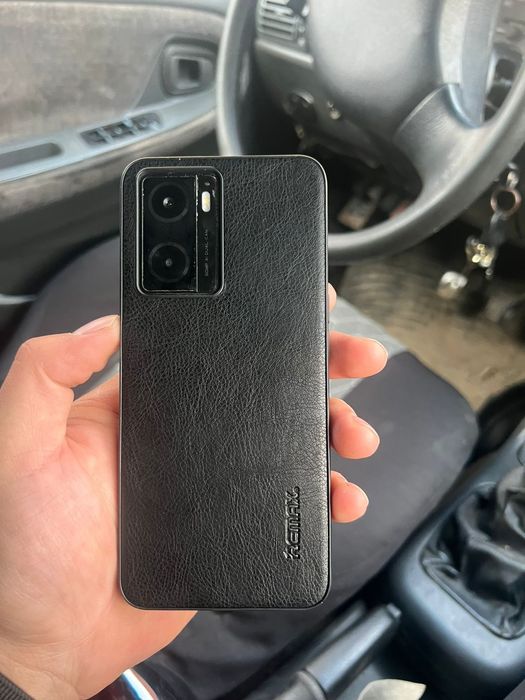 OPPO A 77 каропкасымен