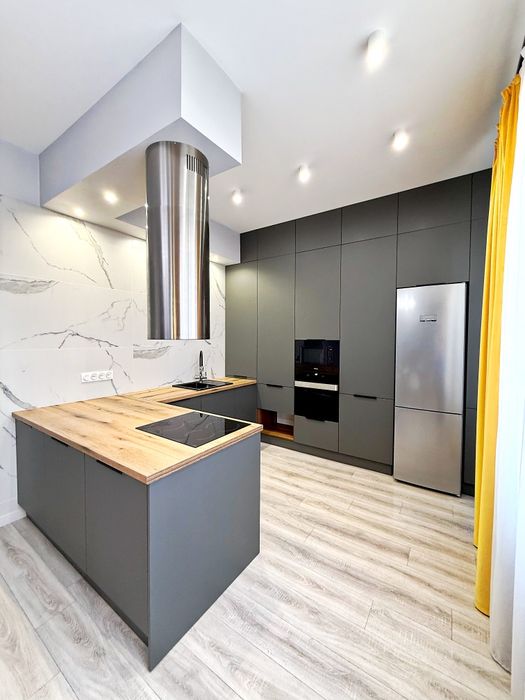 Квартира с современным ремонтом в таунхаусе