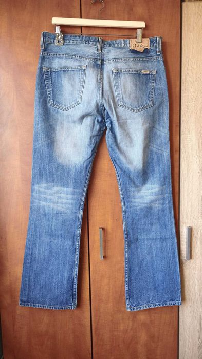 blugi boot cut Levi Strauss,	talie 36,	lungime 33,	fermoar,	denim blue