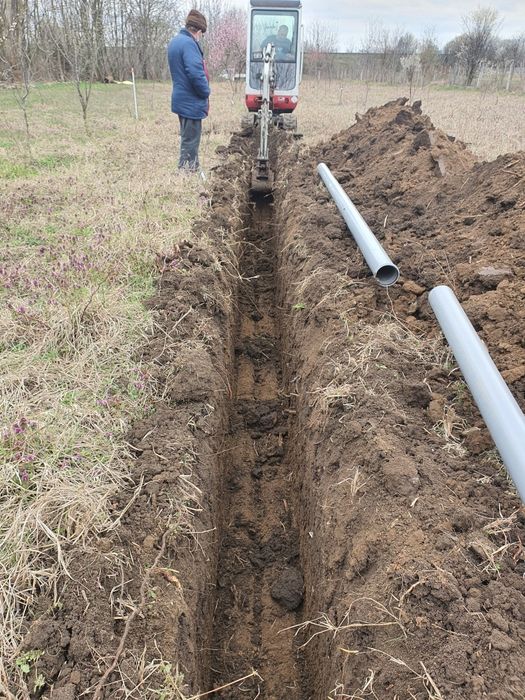 Buldoexcavator excavator bobcat fose septice