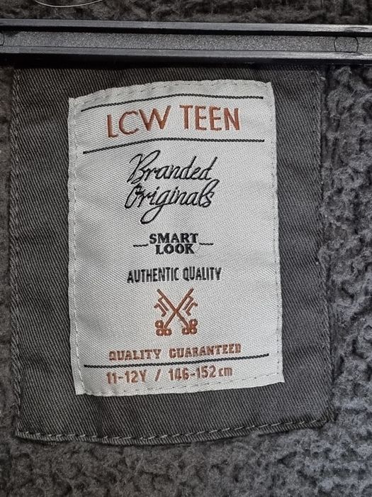 Зимняя куртка (146-152см)