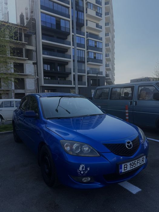 Mazda 3 an 2004 benzina