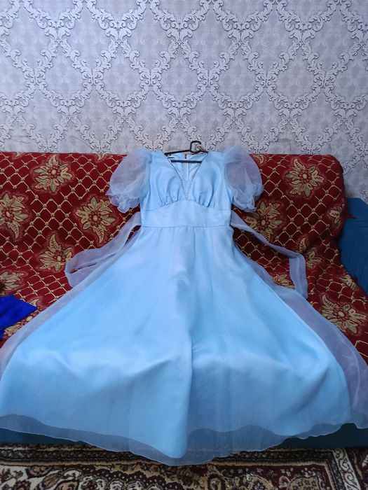Женские одежды..