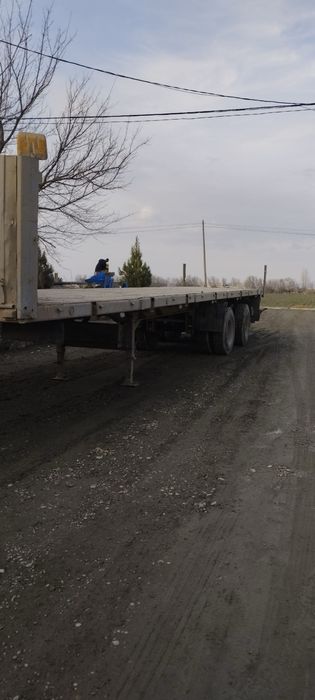 Маз полуприцеп сотилади.