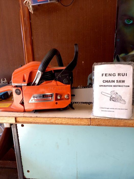 Цепная бензопила новая
