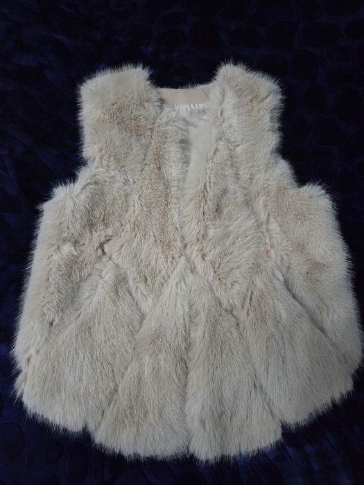 Дамски пухен елек