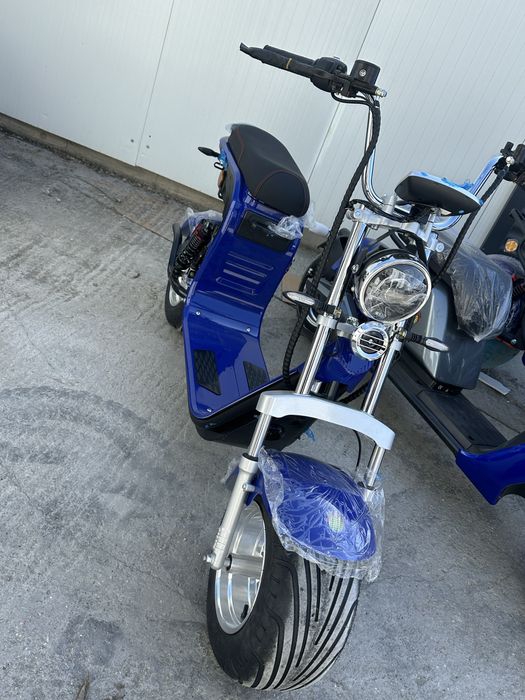 scuter electric model cu cartelă 2026