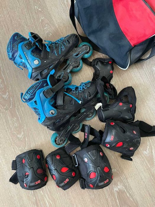 Роликовые коньки