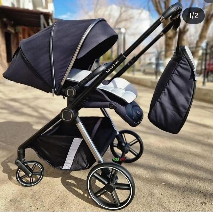 Прогулочная всесезонная коляска