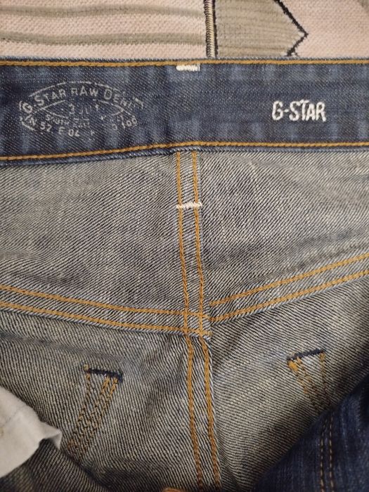 Фирменные джинсы