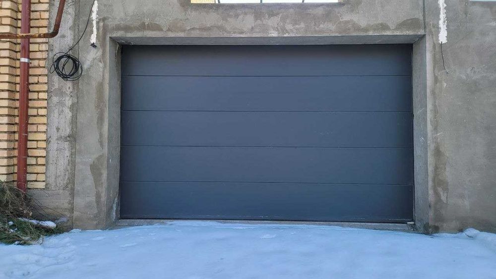 Автоматические Секционные ворота Erreka Испания.