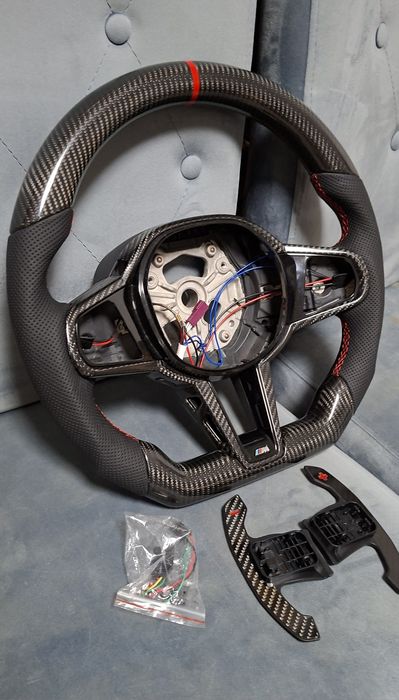 Volan carbon   BMW  Seria 1: 19-24 ,BMW  Seria 2: 19-24 ,Bmw Seria 3:19-24,BMW Seria 4: 19-24
BMW 3 Series (G20) incalzire si vibratii.