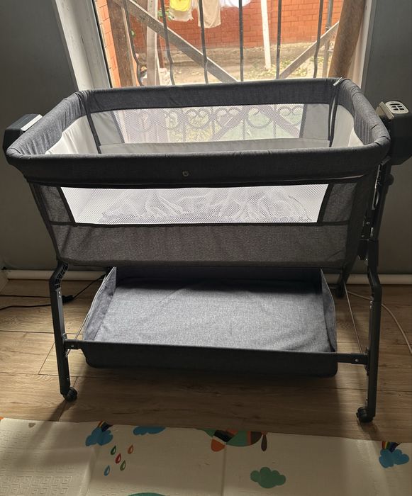Детская кроватка Kidilo с автоукачиванием