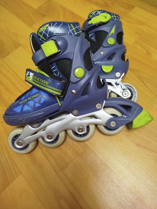 Роликовые коньки