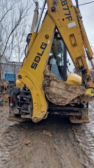 Экскаватор погрузчик 3в1