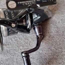 Mulinete spinning daiwa si shimano