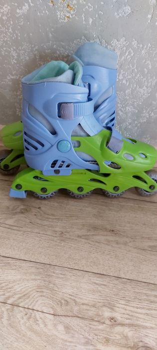 Роликовые коньки