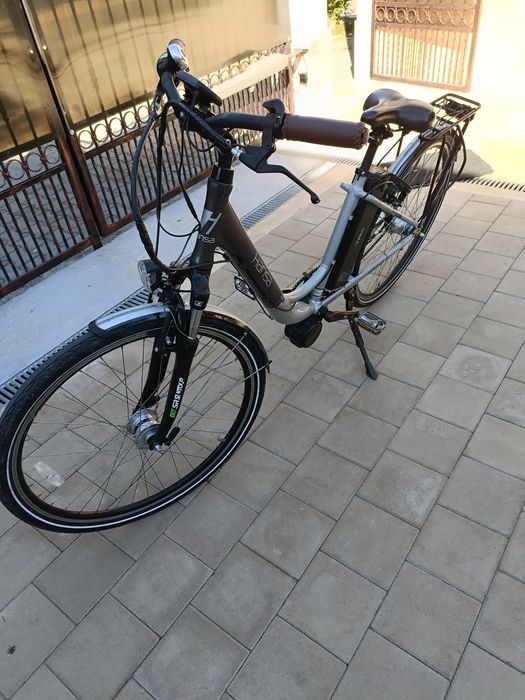 Bicicleta electrica Hansa enovation baterie 36v incarcator st 36v schimbator shimano nexus 7 viteze dinam in butuc pt persoane 150 kg,baterii 24v trio