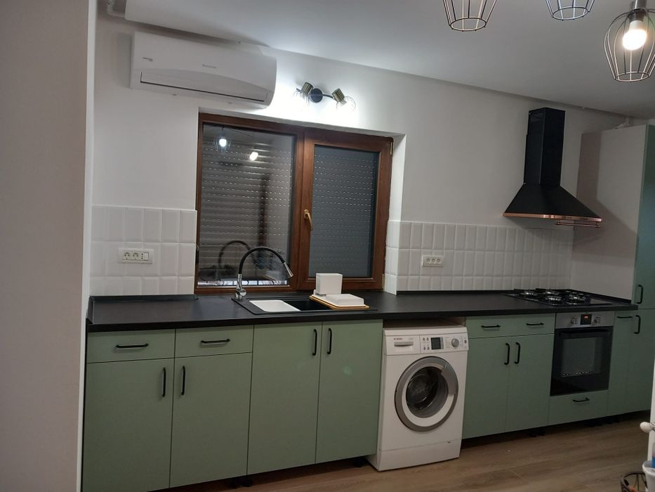 Apartament cu o camera, loc de parcare, curte privata