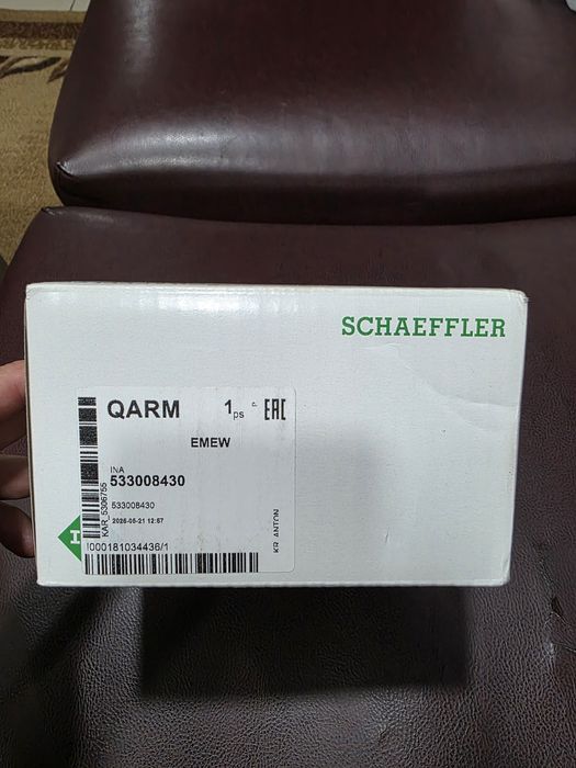 Натяжитель ремня w124