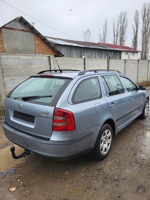 dezmembram skoda octavia 2 usa fata stanga/ usa fata dreapta/motor