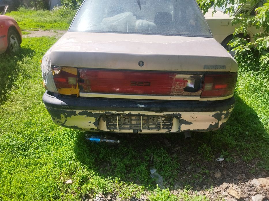 Мазад 323  на ходу